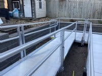 aluminum wheelchair ramp installed for access to garage and home entrance in Robbinsdale Minnesota