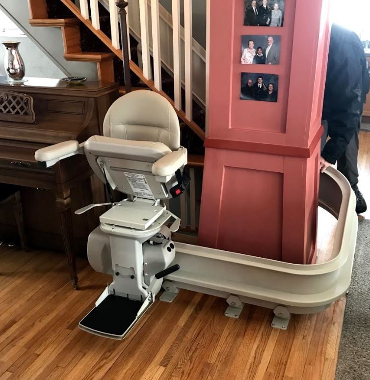 Bruno Elite curved stairlift built with a rail overrun