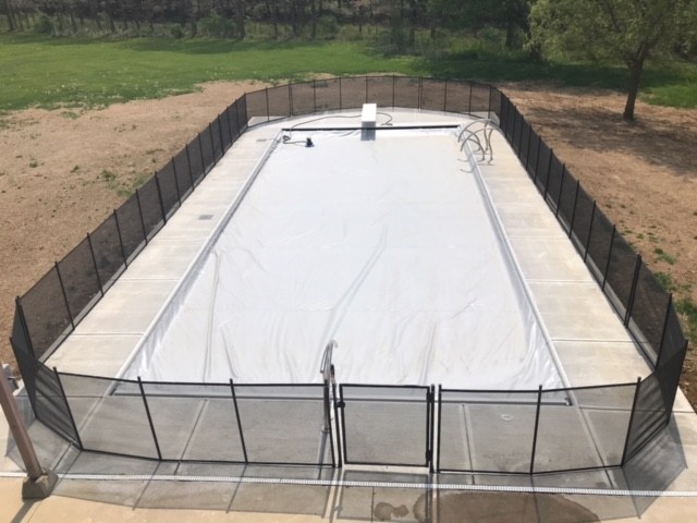 Pool Fence with White Cover