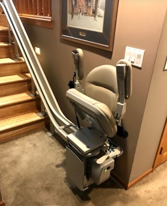 curved stairlift in St. Paul with components folded upward