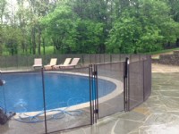 Well Lit Flat Stone pool fence finished
