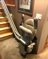 curved stairlift in St. Paul with components folded upward
