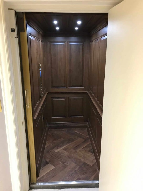 home elevator with oak wood interior in Huntington Beach CA home by Lifeway Mobility
