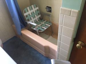 lawn chair in bath tub