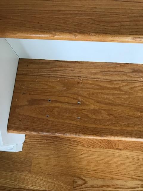 close-up of step after stair lift removal.