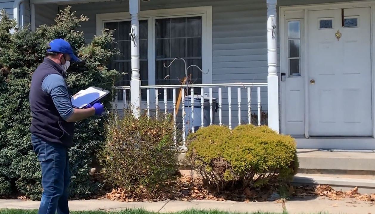 Lifeway Mobility consultant measuring site for used wheelchair ramp