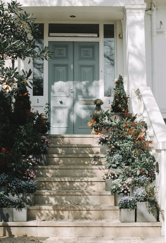 staircase leading to front door of a house