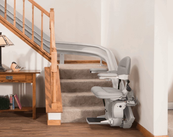 Bruno Elite Curved Stairlift with Gray Upholstery