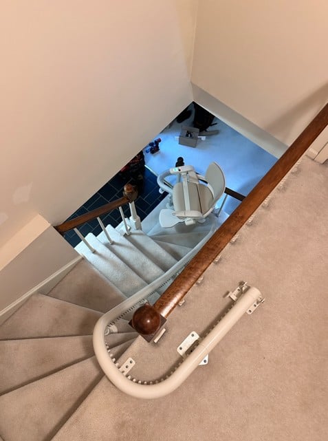 Otolift modular curved stair lift in home
