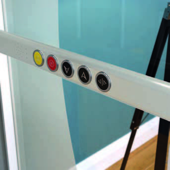 Pollock elevator cab handrail with controls option