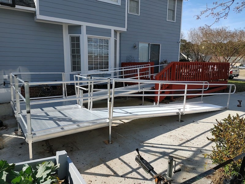 aluminum wheelchair ramp installed at back deck by Lifeway Mobility