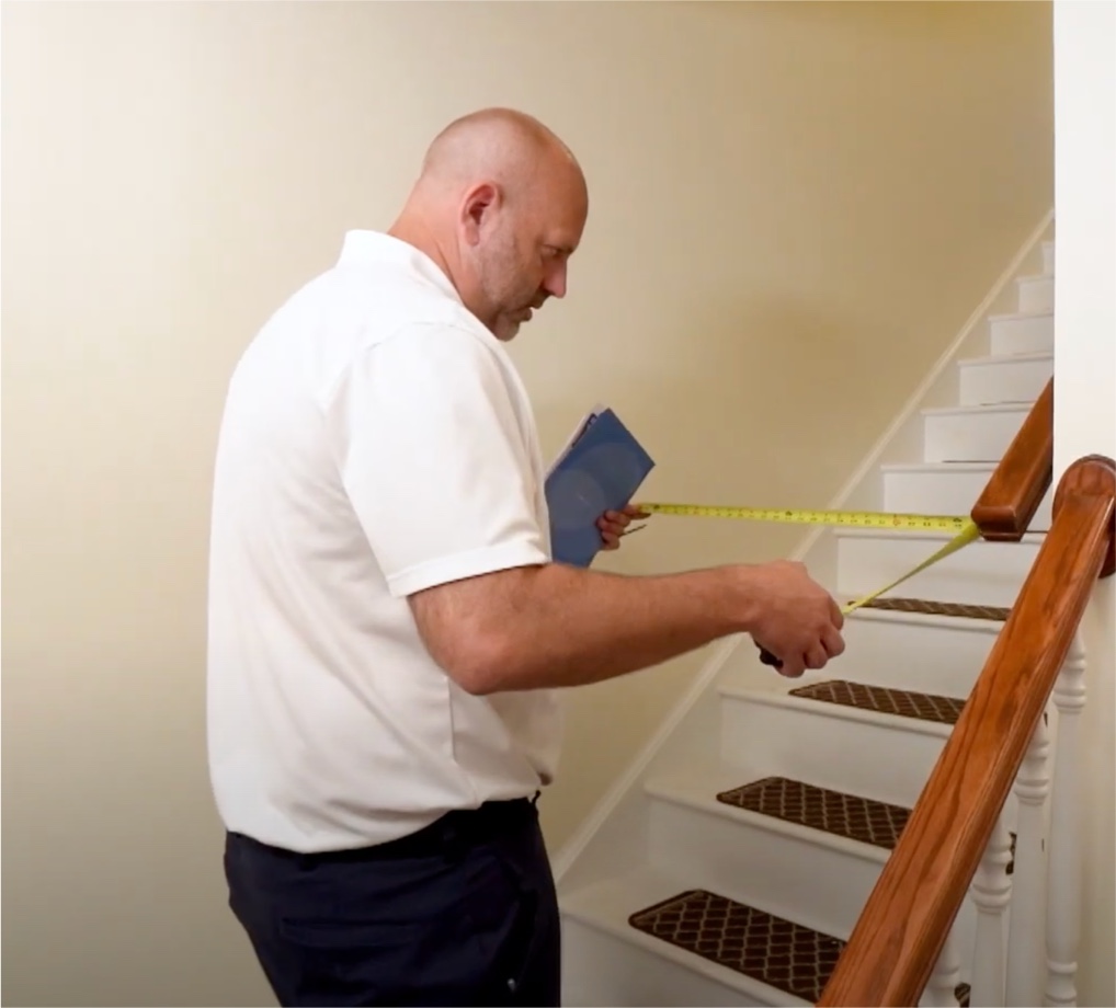 Lifeway Mobility professional stair lift technician measuring customer's stairs