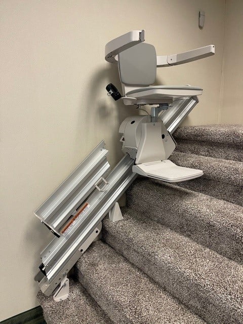 Bruno Elan stair lift with folding rail in Lifeway PIT showroom