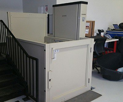 commercial wheelchair lift installed in Tesla dealership by Lifeway Mobility