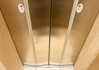 Cambridge Elmira elevator with bifold doors