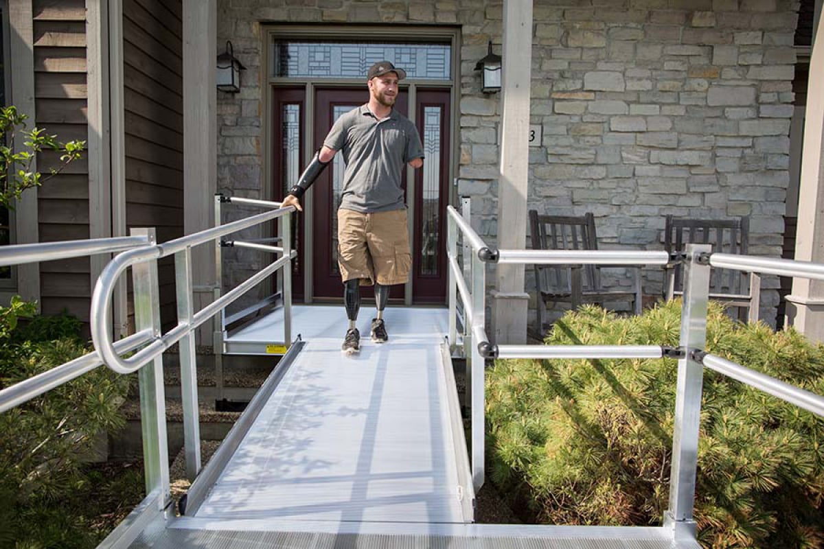 amputee using ramp to safely exit his home