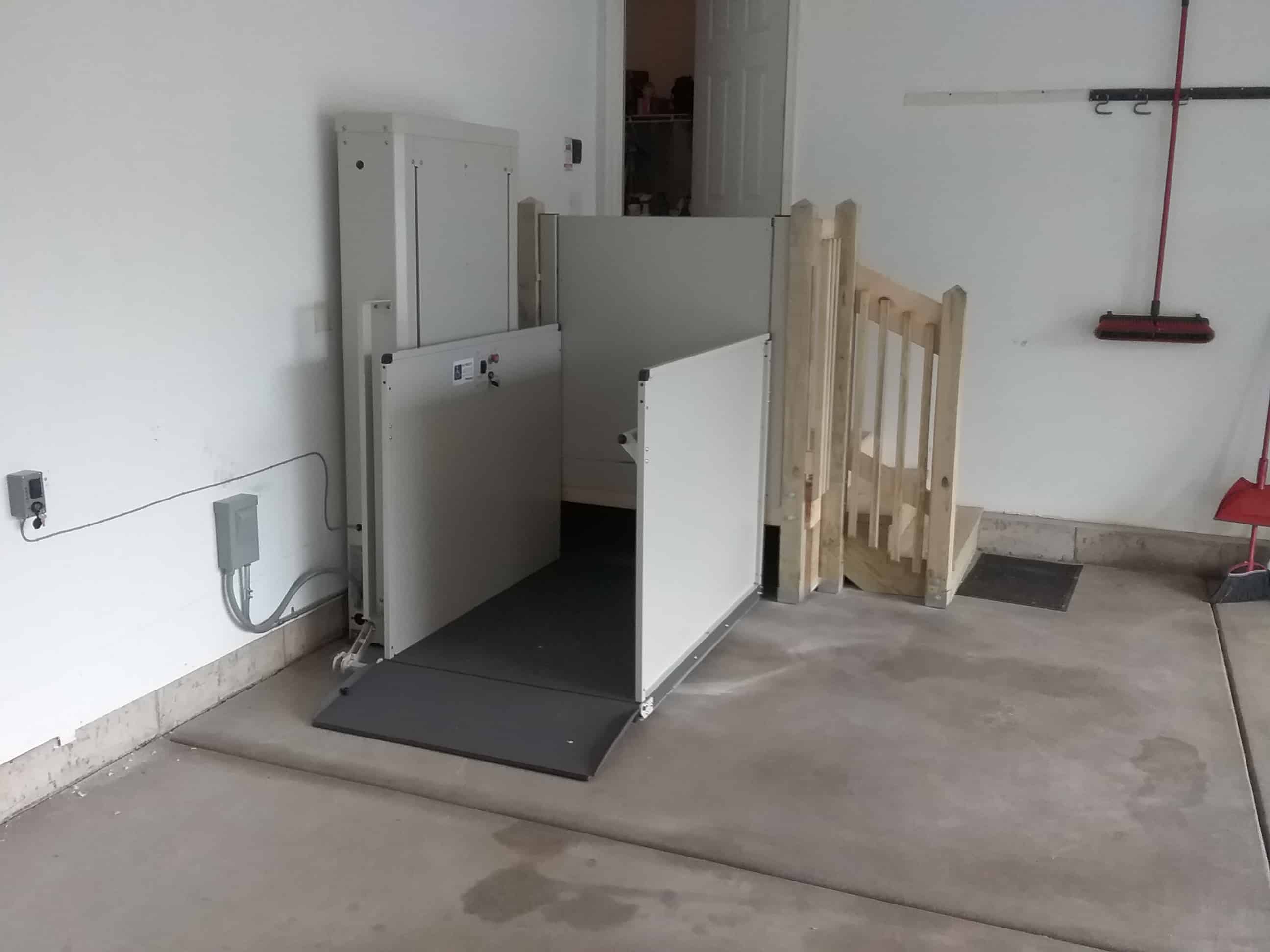 wheelchair lift installed in garage to provide access to home entrance in Woodstock, IL