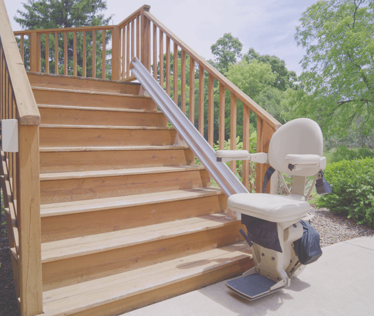 woman fastening her seat belt before she uses her stair lift