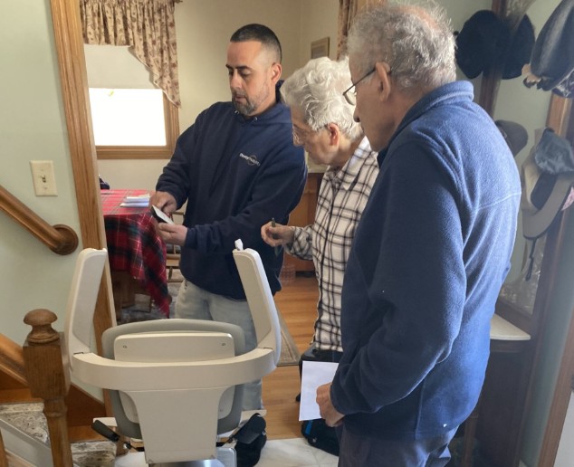 Lifeway Mobility technician provides demonstration of stair lift after installation