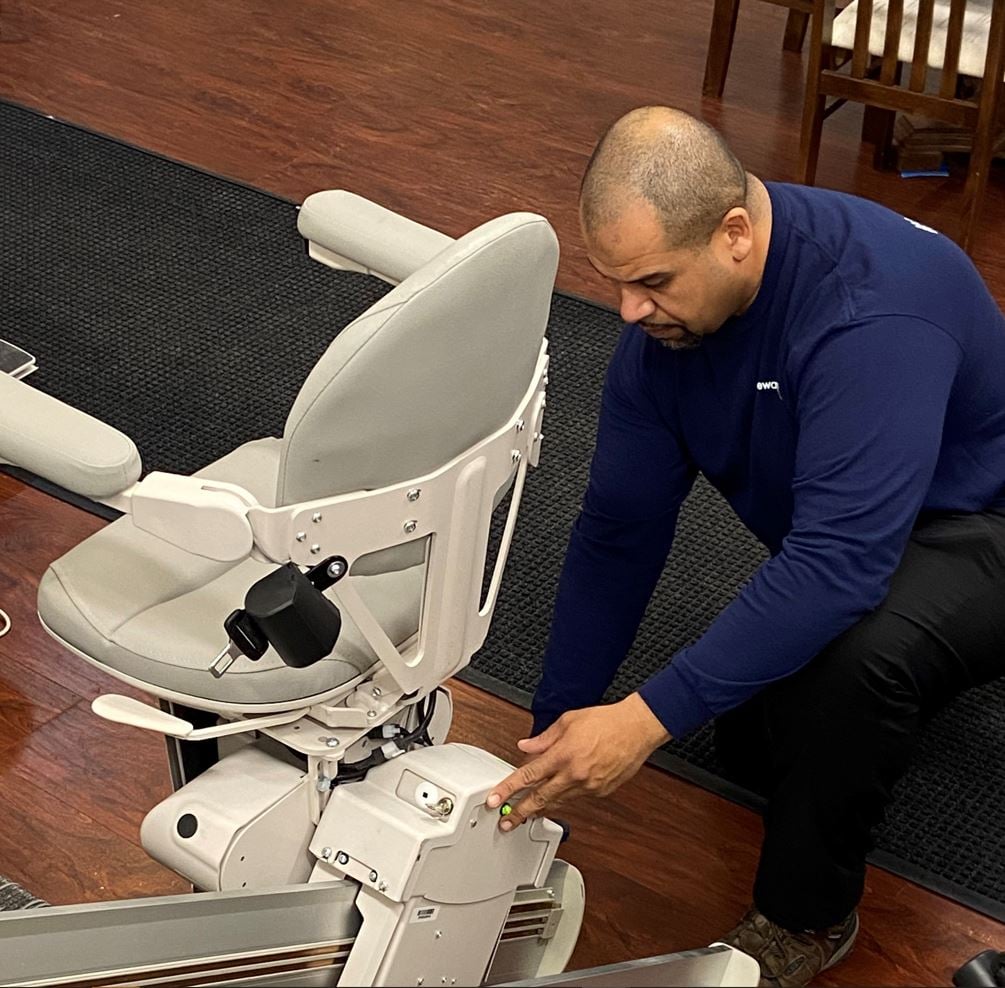 Lifeway Mobility professionally trained technician provides service on stair lift