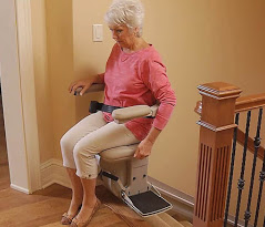 woman utilizing the arm-activated power swivel seat on a Bruno Elite stair lift
