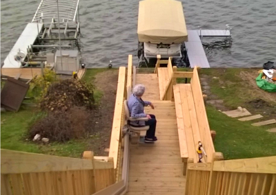 outdoor stair lift leading to lake in backyard of home from Lifeway Mobility