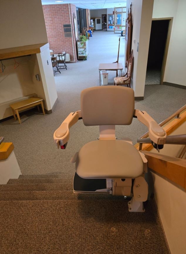 new stair lift provided by Lifeway Mobility swiveled at top landing
