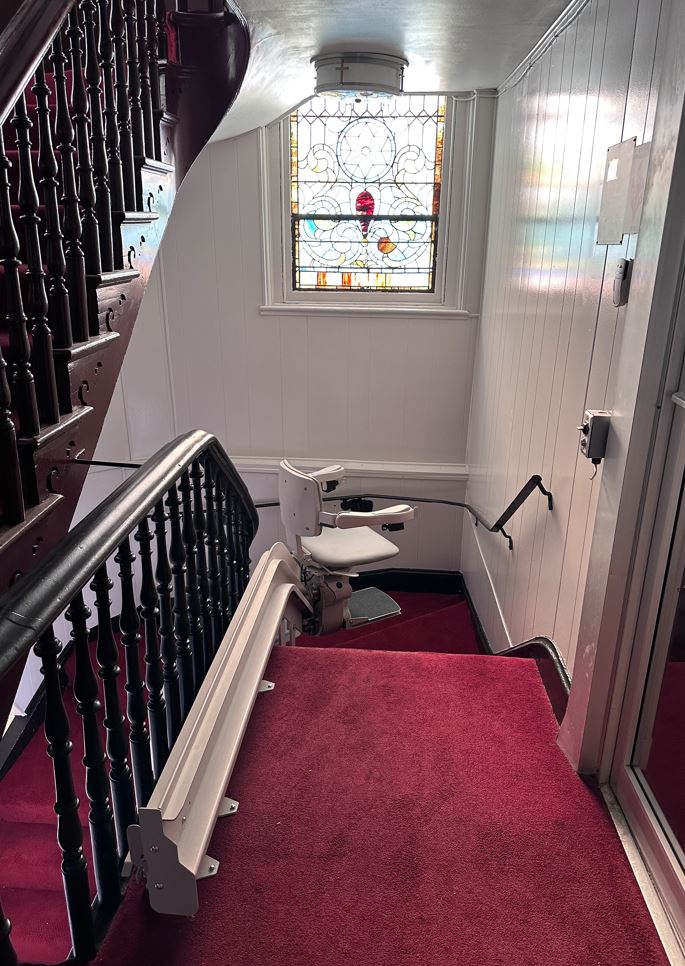 Lifeway installed curved stairlift with rail overrun park position