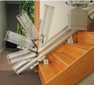 stair lift folding rail in action