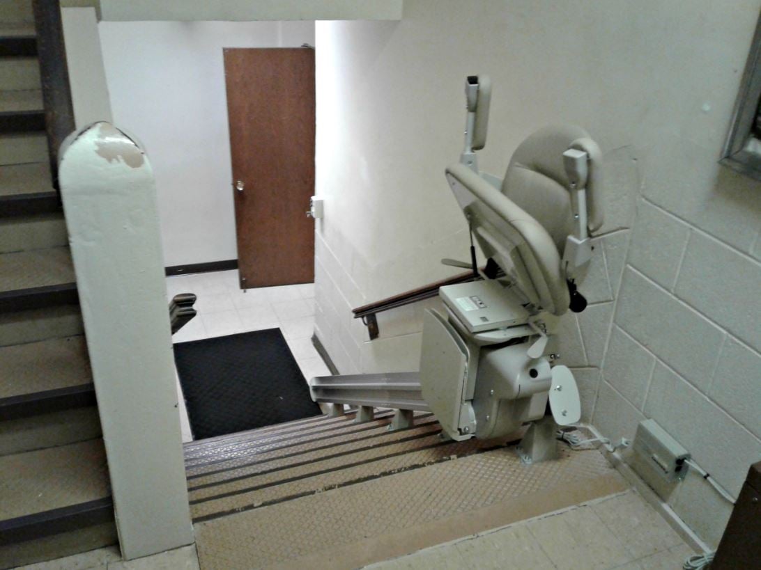 stair lift installed on common area stairwell in in Chicago, IL