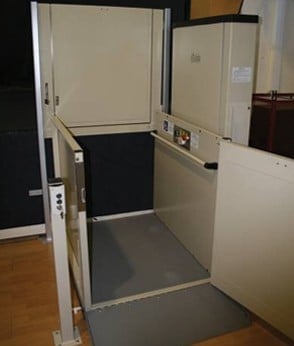 An indoor wheelchair lift  helps overcome levels/steps inside of a home