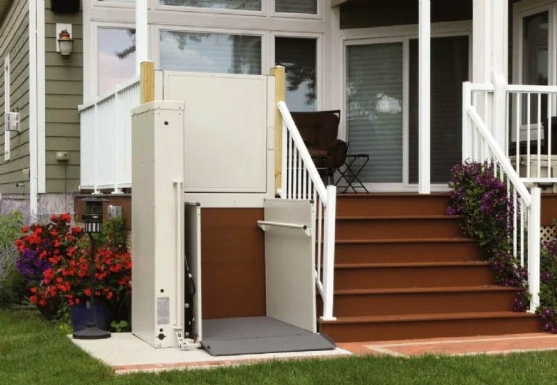 Outdoor wheelchair lift custom installed to match the design of a home