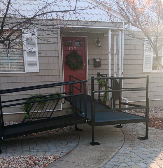 aluminum wheelchair ramp painted black and installed by Lifeway Mobility