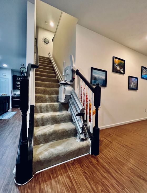 Bruno-Elan-stairlift-with-power-folding-rail-and-components-folded-up-installed-in-OH-basement-stairs-by-Lifeway-Mobility.JPG
