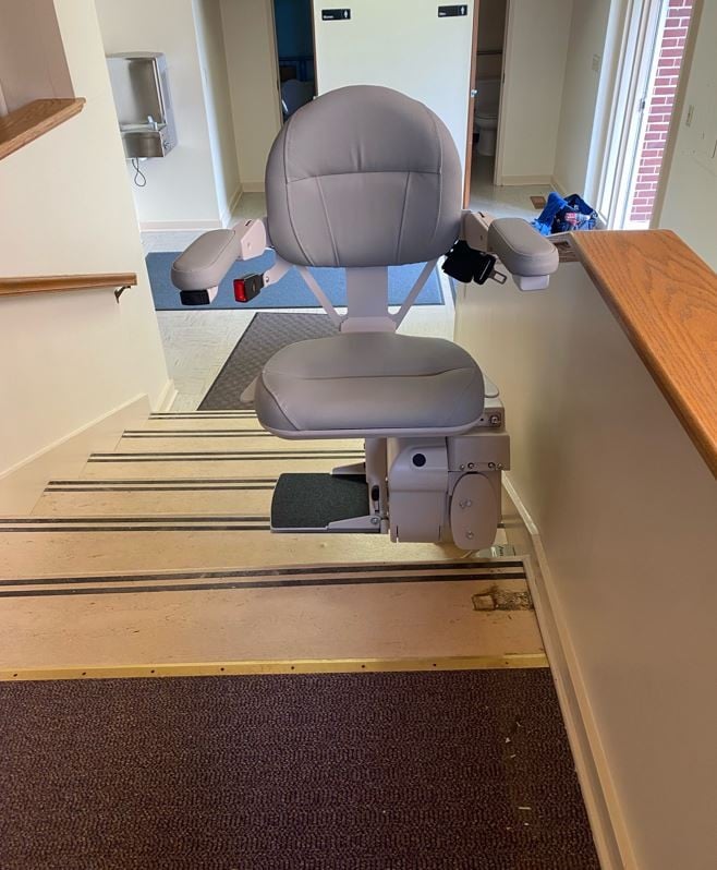 Bruno Elite commercial stairlift swiveled at top landing in church in Indiana