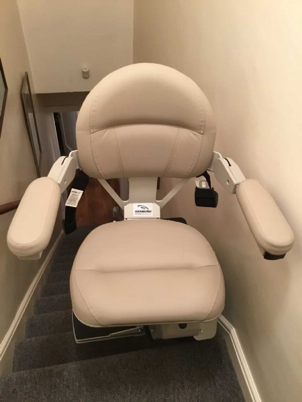 Bruno Elite stairlift with seat swiveled at top landing in Oakland CA