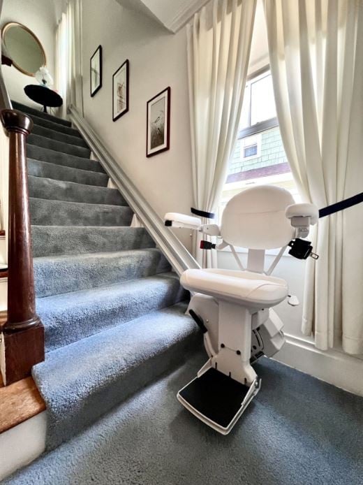 Bruno Elite stairlift with white upholstery installed by Lifeway Mobility Columbus Ohio