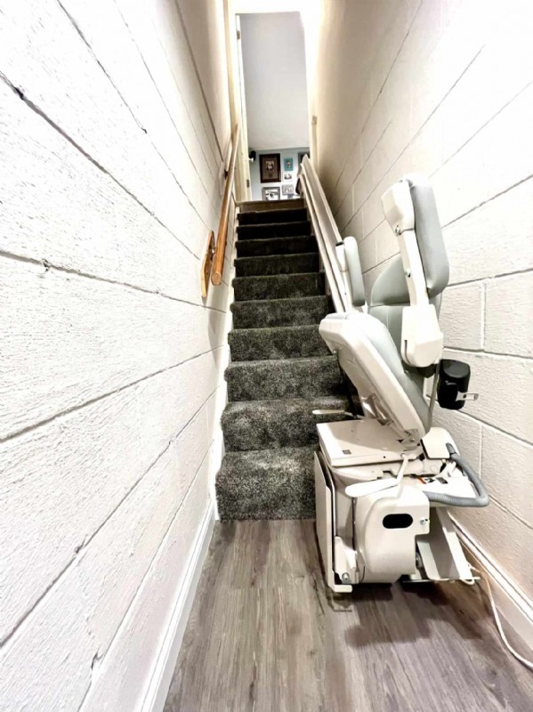 Bruno-curved-stairlift-with-components-folded-up-installed-by-Lifeway-Mobility.jpg