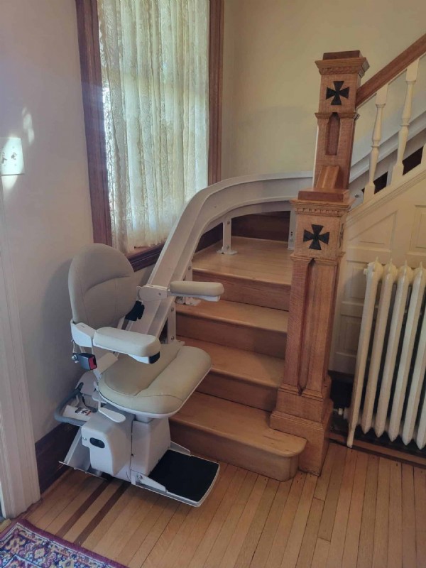 Bruno-curved-stairlift-with-tan-upholstery-installed-by-Lifeway-Mobility-in-Harrisburg-PA.jpg