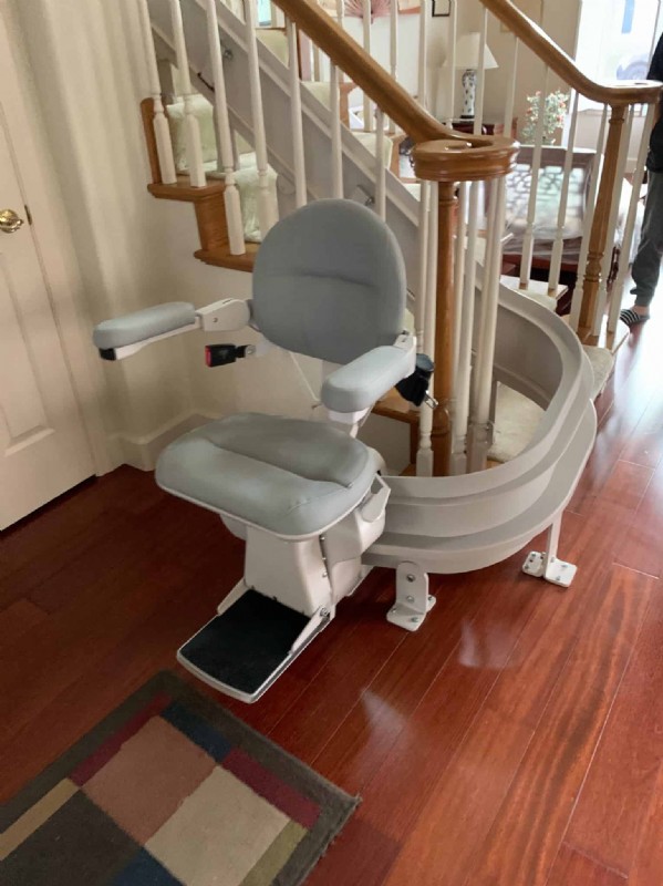 Bruno custom curved stairlift with bottom landing overrun in San Jose CA