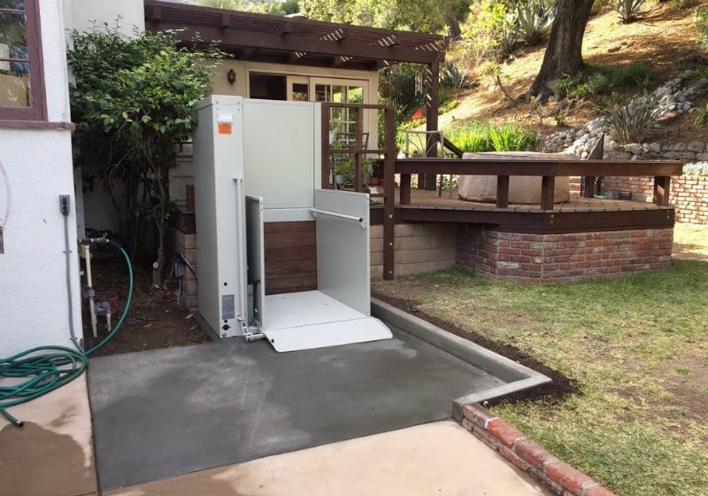 Bruno vertical platform lift installed in backyard of home in Irvine CA