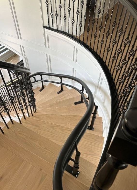 Hamar-Helix-curved-stairlift-special-bend-black-rail-professionally-installed-by-Lifeway-Mobility.JPG
