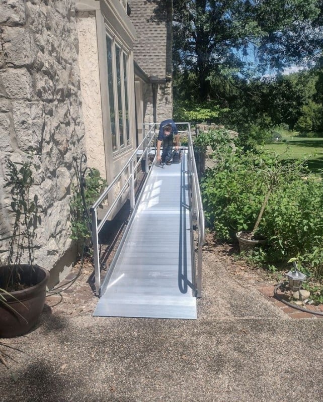 Lifeway-Mobility-technician-finishes-installation-of-wheelchair-ramp-in-Kansas-City.JPG