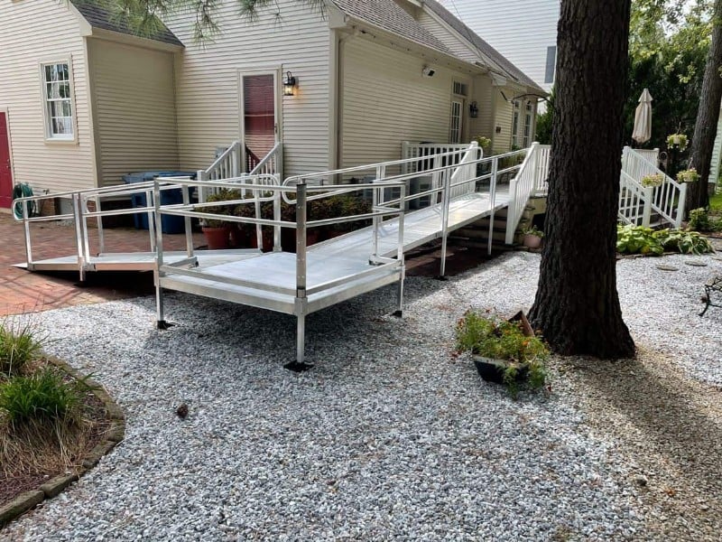 aluminum-wheelchair-ramp-installed-over-pavers-and-rocks-outside-of-Philadelphia-home.JPG