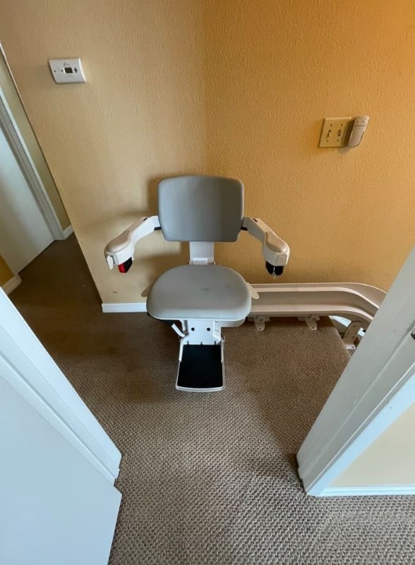 curved-stairlift-San-Diego-at-top-landing-of-stairs.JPG