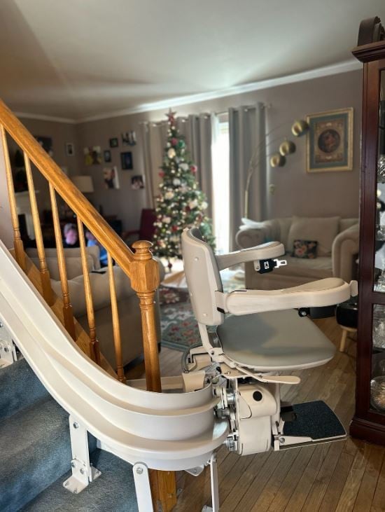 curved-stairlift-with-180-degree-bottom-overrun-installed-by-Lifeway-Mobility.JPG