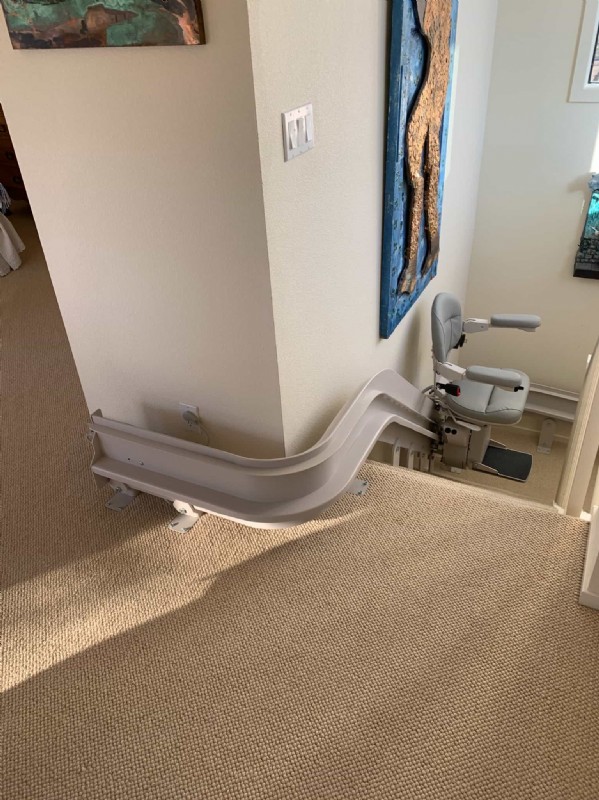 curved-stairlift-with-rail-overrun-in-San-Francisco-home.JPG
