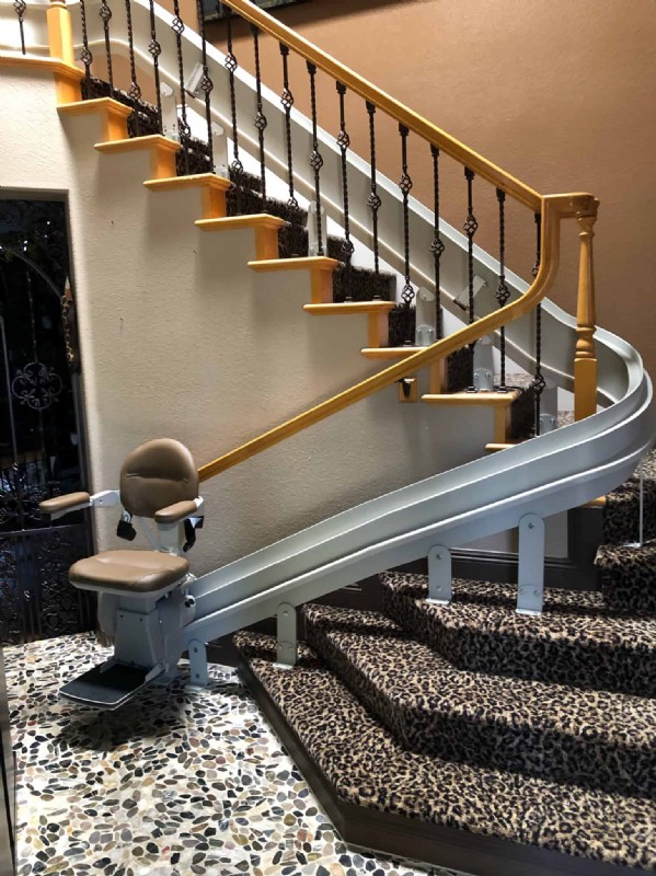 custom-curved-stairlift-on-cheetah-print-stairlift-in-Hollywood-CA-home.JPG