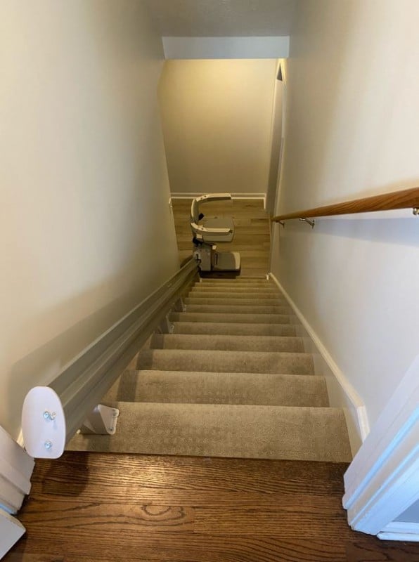 stairlift-at-bottom-landing-of-stairs-in-home-in-Carmel-Indiana-installed-by-Lifeway-Mobility.JPG