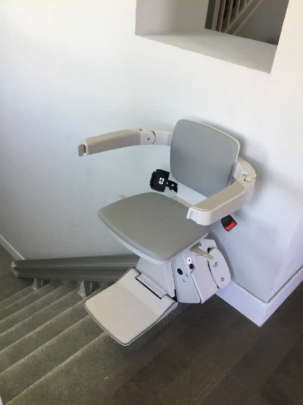 stairlift in San Jose at top landing of staircase